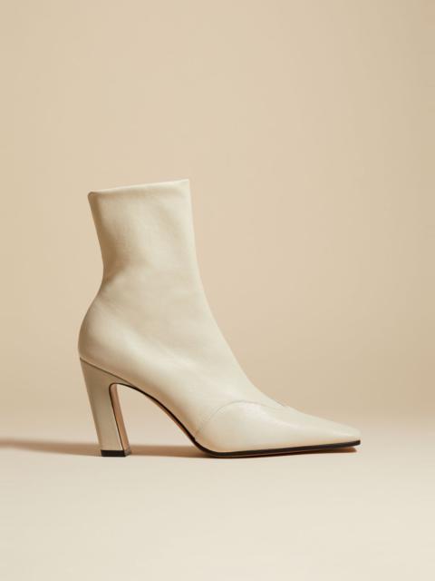 KHAITE The Dallas Stretch Ankle Boot in Off-White Leather