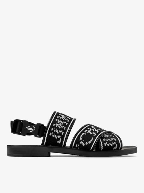 JIMMY CHOO Jude Sandal/M
Black and White Distorted Jimmy Choo Print Webbing Sandals