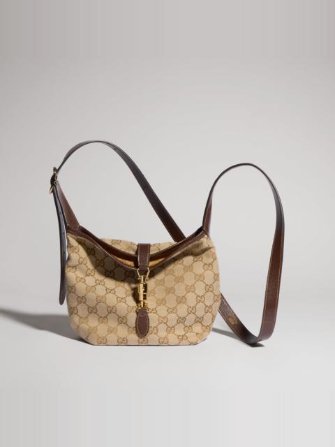 GUCCI GG mini bag with piston closure