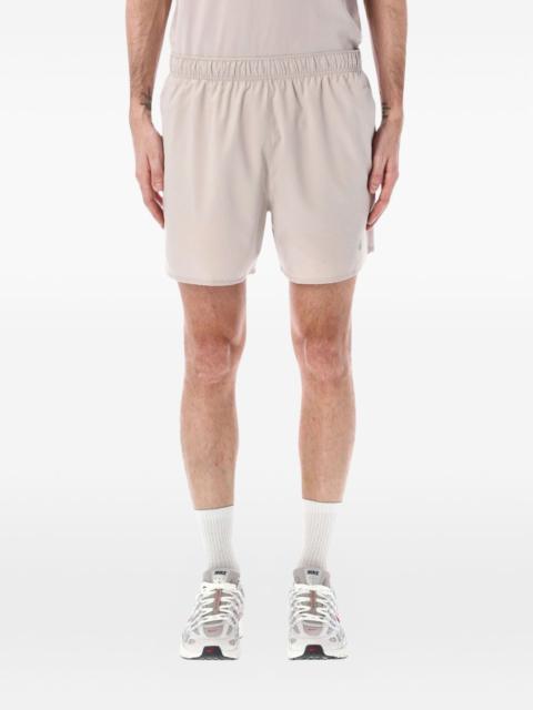 Nike logo-detail running shorts