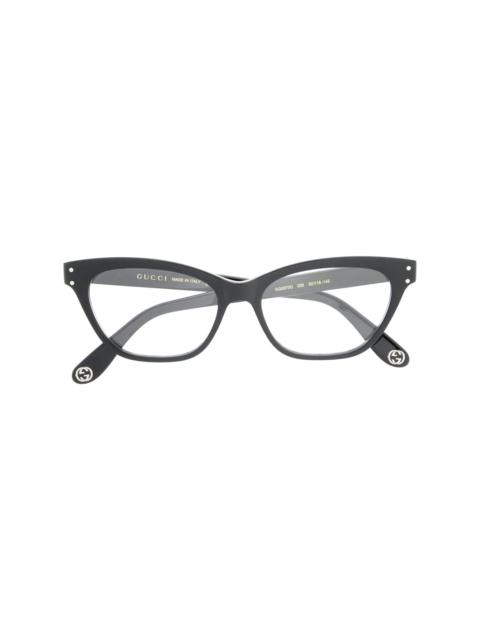 cat eye-frame glasses