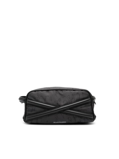 Alexander McQueen cross-strap logo-print wash bag