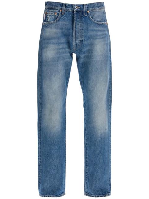 JEANS WITH METALLIC V DETAIL