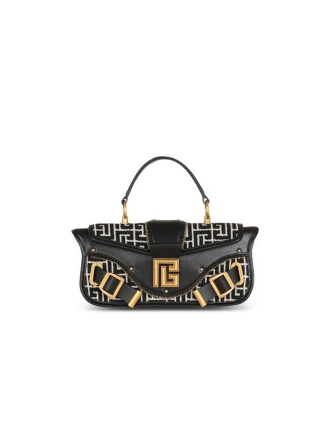 Balmain Blaze leather clutch bag with jacquard monogram