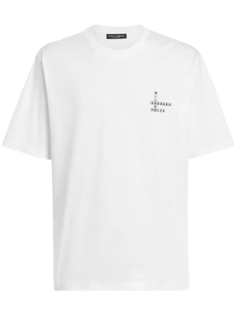 Dolce & Gabbana COTTON T-SHIRT WITH CROSSWORD PRINT