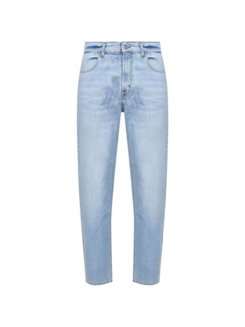 7 For All Mankind faded-wash denim jeans