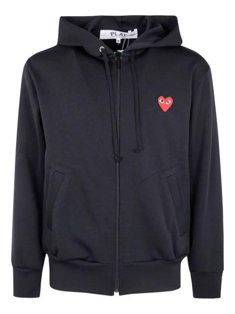 Comme des Garçons PLAY Introducing the "RED EMBLEM HEART" SWEATSHIRT from the iconic brand COMME DES GARCONS PLAY, a quinte