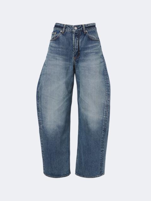 Alaïa Faded barrel-leg jeans
