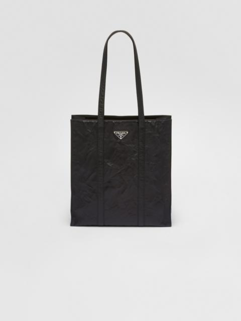 Shop PRADA Re-nylon padded tote bag (1BG373_RDJN_F0002_V_O1O,  1BG373_RDJN_F0F24_V_O1O) by daru-m