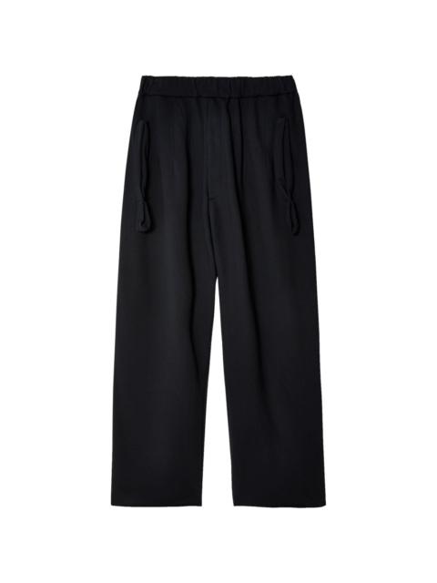 RANDOM IDENTITIES detailed-pocket wide-leg trousers