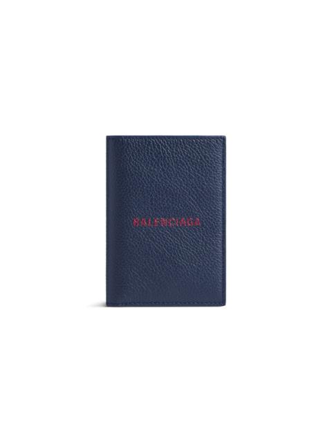 BALENCIAGA Men's Cash Vertical Bifolded Wallet in Navy/burgundy