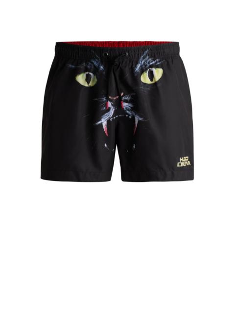 HUGO SWIM SHORTS WITH CAT GRAPHIC PRINT