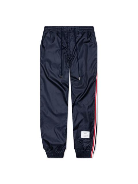Thom Browne THOM BROWNE RIPSTOP RWB SIDE STRIPE TRACK PANTS - NAVY