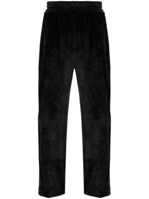 GCDS logo-embroidered velvet trousers