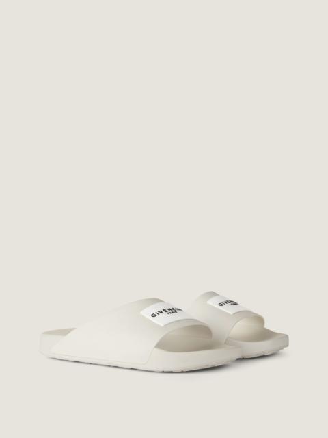 Givenchy LABEL SLIDE MULES IN RUBBER