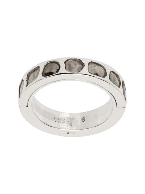 Parts of Four Silver Sistema Ring