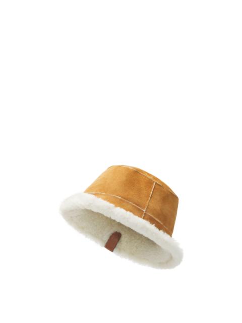 Loewe Reversible Anagram bucket hat in shearling