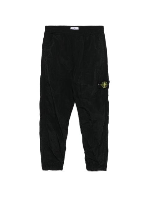 Compass-badge trousers