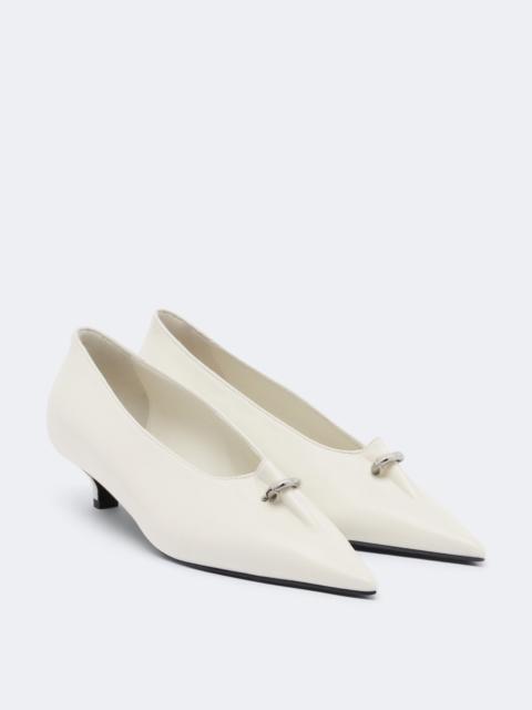 TOTEME Pierced embellished leather pumps