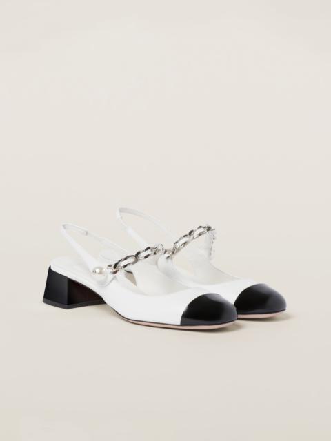 Miu Miu Two-tone patent leather slingback pumps