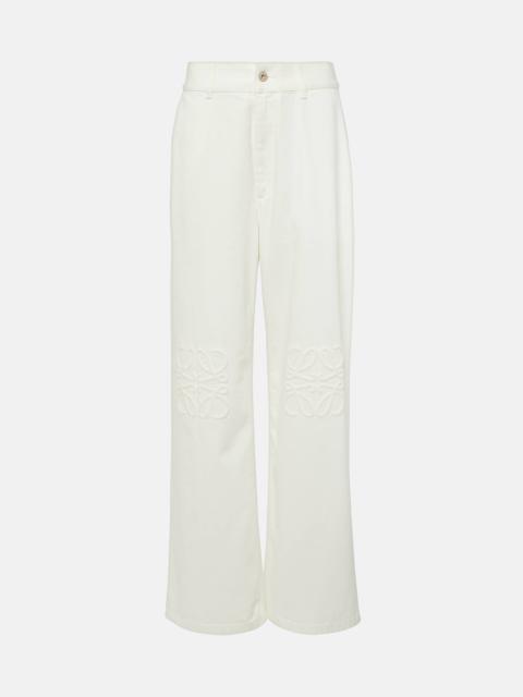 Anagram leather-trimmed wide-leg jeans