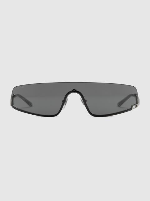 GUCCI Mask-shaped frame sunglasses | REVERSIBLE
