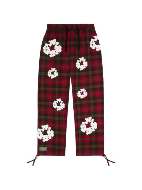 DENIM TEARS Wreath checked trousers