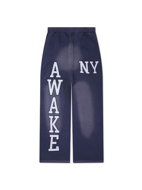 AWAKE NY COLLEGIATE OPEN HEM SWEATPANT - NAVY