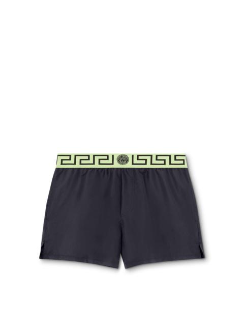 VERSACE Greca-jacquard swim shorts