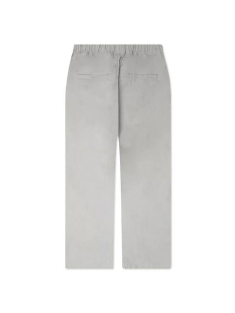 ESSENTIALS logo-patch straight-leg trousers