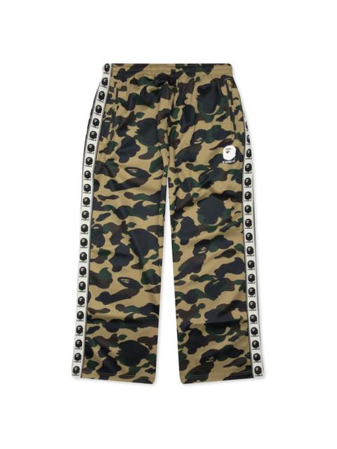 A BATHING APE® 1ST CAMO LOOSE FIT TRACK PANTS - YELLOW