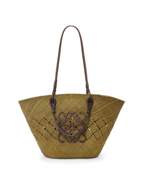 Anagram Basket bag in iraca palm and calfskin