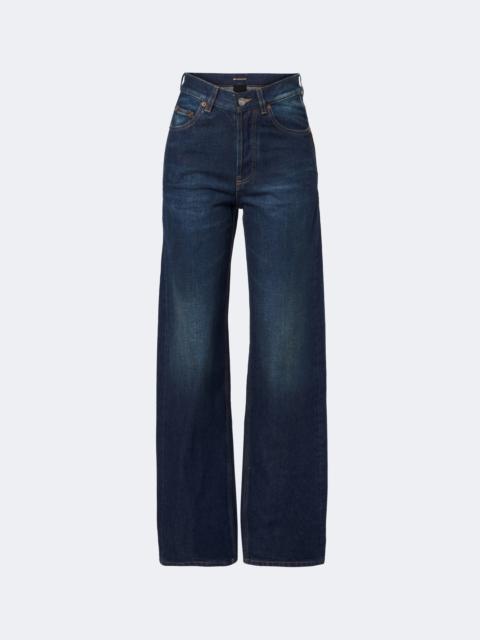 SAINT LAURENT Faded wide-leg jeans