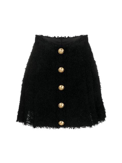 pleated tweed miniskirt