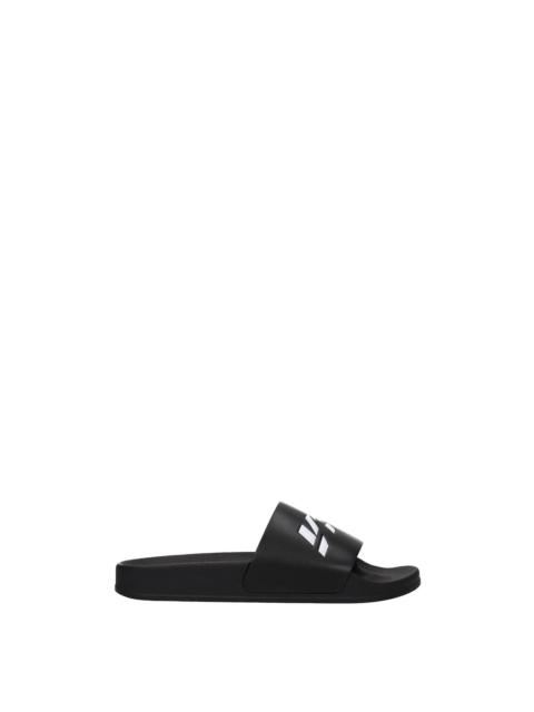 VETEMENTS Slippers and clogs Leather Black White