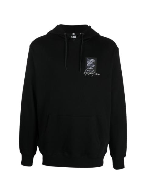 Yohji Yamamoto quote-patch drawstring hoodie